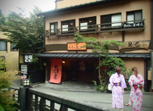 2 girls in yukata in Kurokawa Onsen village