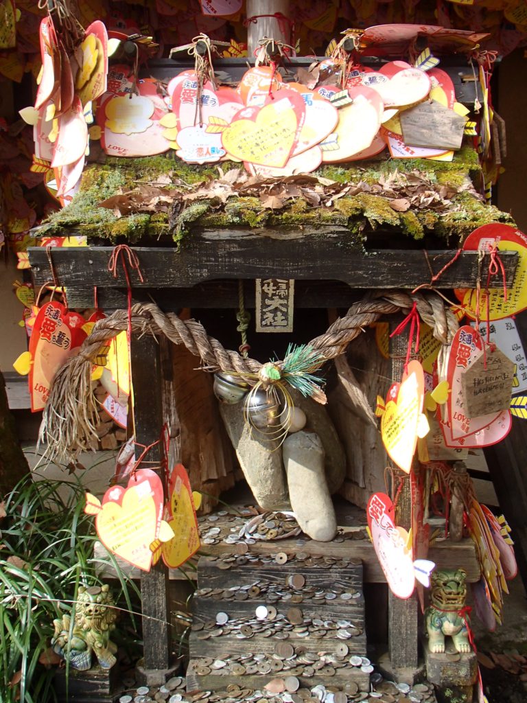 shrine covered in hearts meoto falls