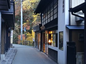 cute hotspring village, Kurokawa onsen village, traditional street in autumn